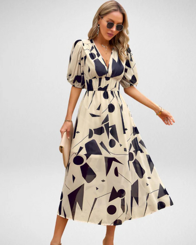ABBY™ | ROBE ÉLÉGANTE À COL EN V AVEC MOTIFS VIBRANTS