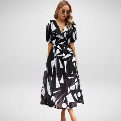 ABBY™ | ROBE ÉLÉGANTE À COL EN V AVEC MOTIFS VIBRANTS