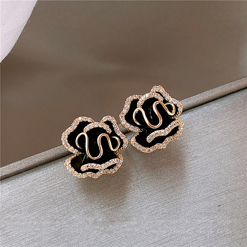 Boucles d'Oreilles Élégantes en Or avec Lotus Noir