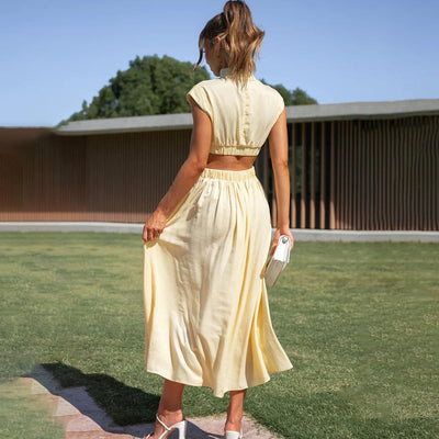 Emilia - Robe élégante à décolleté haut